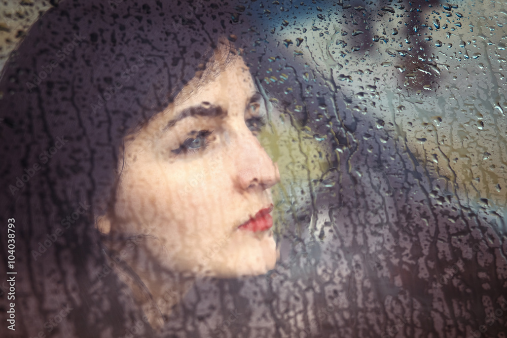 portrait of a young woman in the car