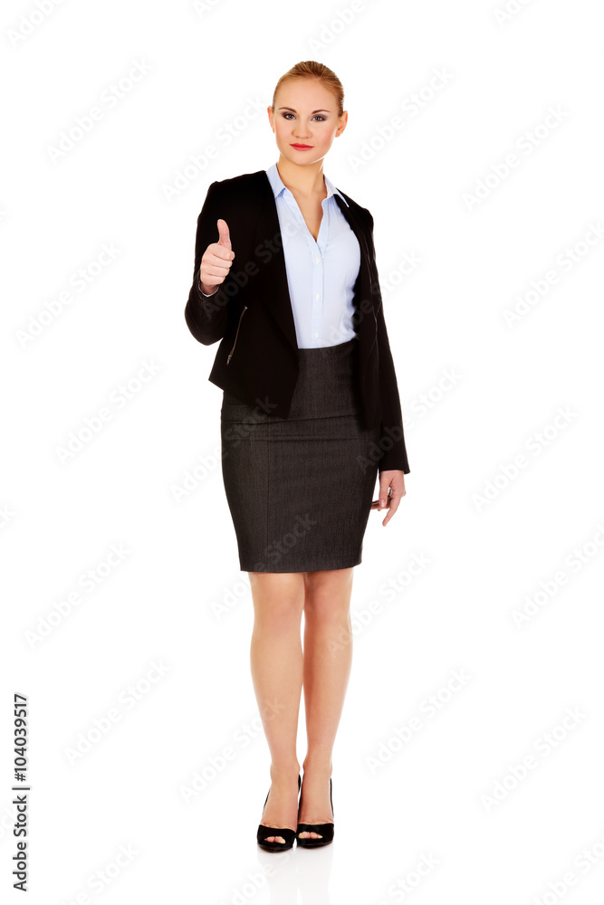 Young happy business woman with thumb up Young happy business woman with thumb up
