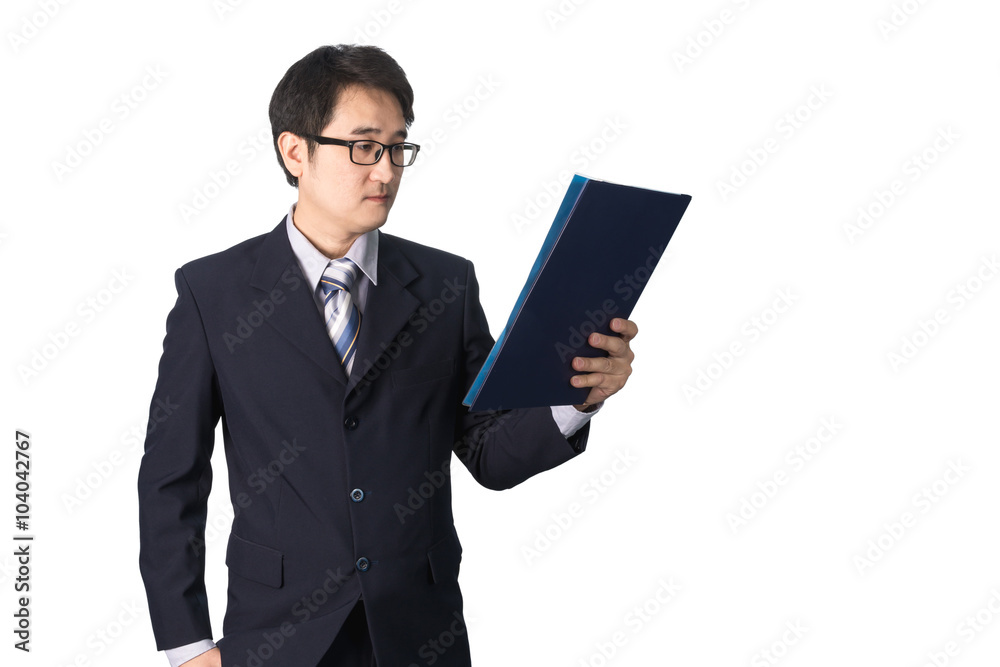 Asian businessman reading important information in file folder, Asian businessman reading important information in file folder,