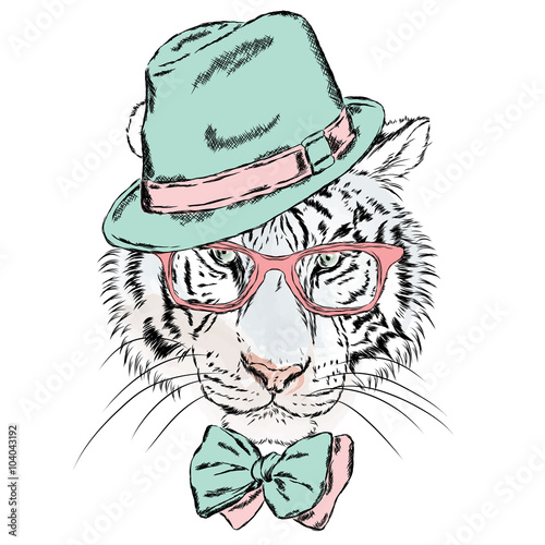Fototapeta Naklejka Na Ścianę i Meble -  Vector tiger wearing glasses and a hat. Cute Tiger clothing. Hipster. Postcard with a predator.