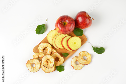 two whole apples and dried apple rings