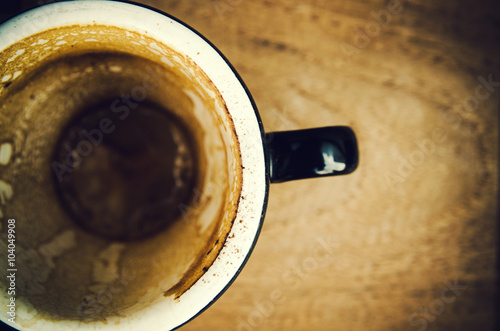 closeup of empty coffee cup , vintage color tone © slonme