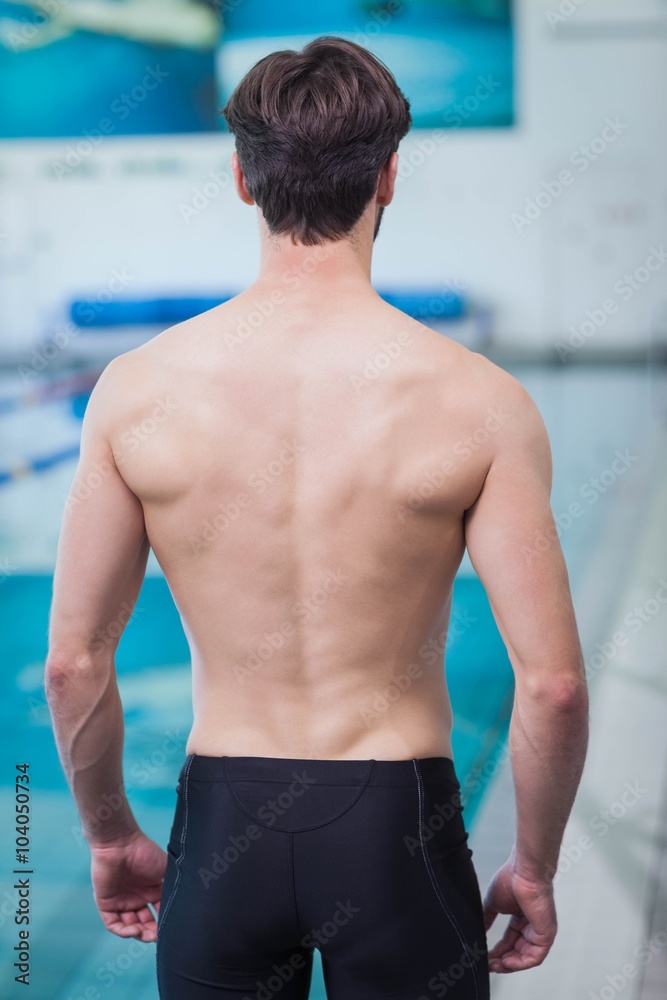 Fototapeta premium Rear view of shirtless man