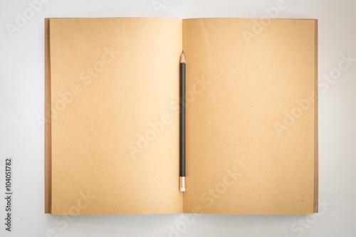 Blank recycle notebook and pencil on white background