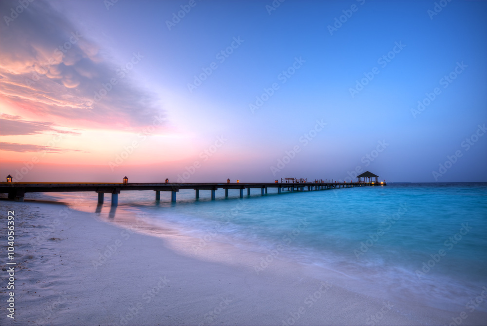 Wooden jetty in sunset