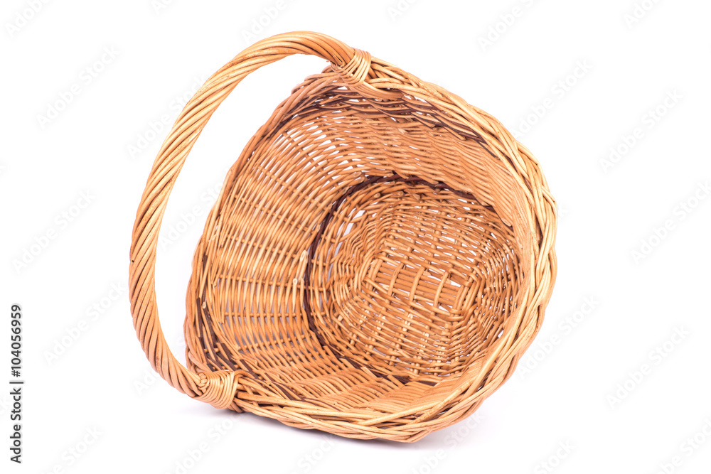 Obraz premium Empty wicker basket isolated on white