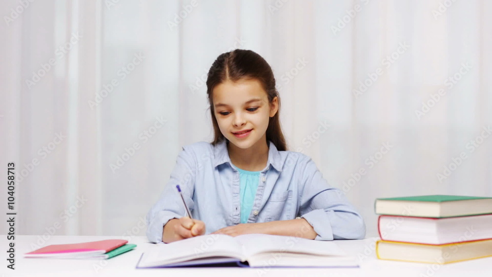happy school girl with books and notepad at home happy school girl with books and notepad at home