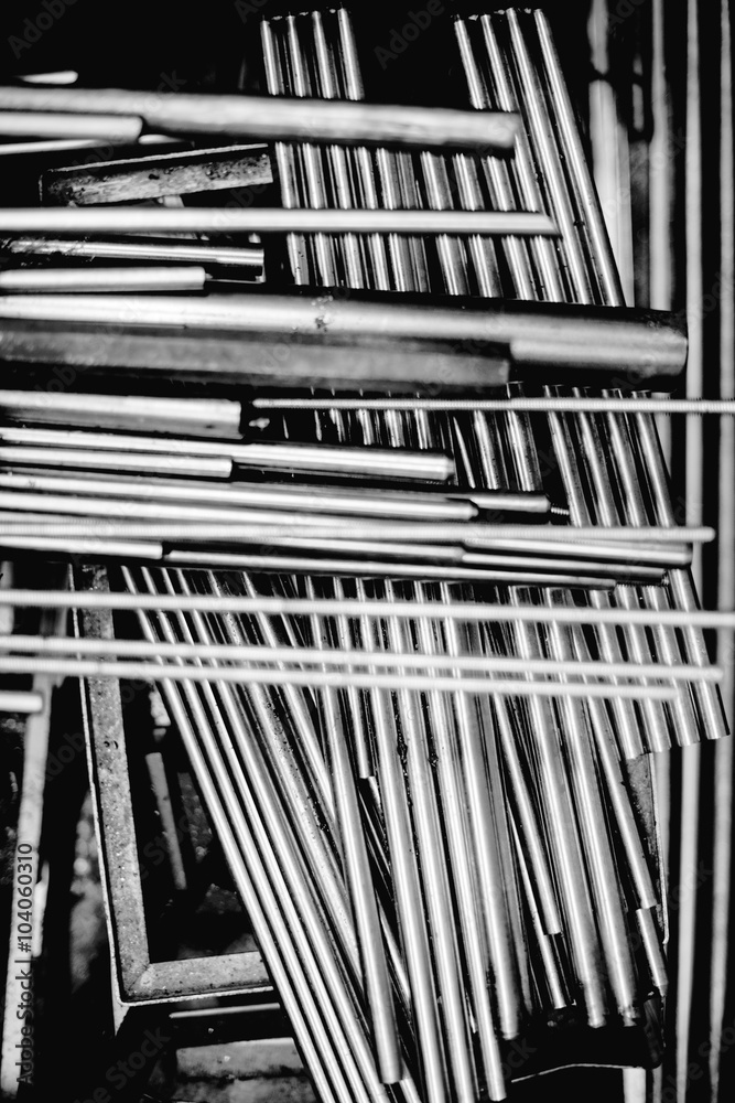 Obraz premium pile of metal pipes and rods