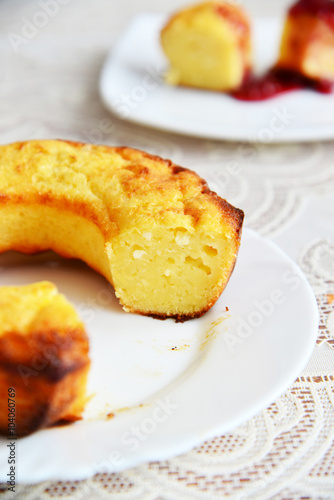 Curd casserole in form of cake with berry jam