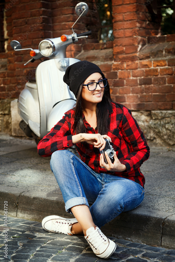 Stylish happy girl, posing with retro camera Stylish happy girl, posing with retro camera
