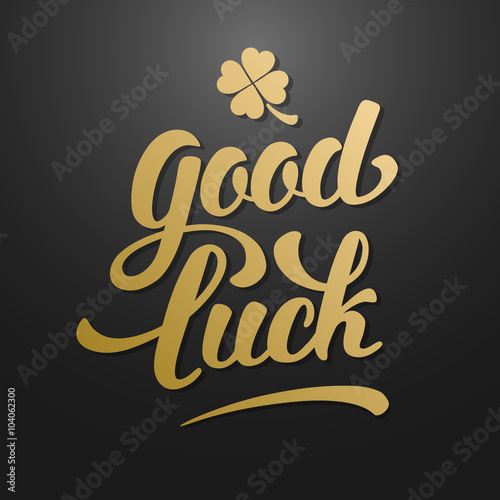 Calligraphic Inscription with Wishes a Good Luck for St. Patrick Day and other Life Events. Clover with Four Leaves - Talisman for Success, Wealth. Hand Drawn Lettering. Vector Illustration.
