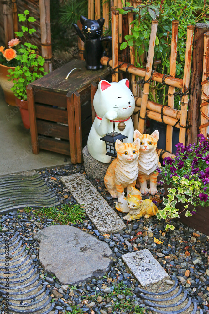 A group of Japanese ceramic cats called maneki neko as lucky
