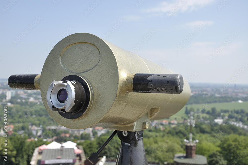 View of the city of Krakow (Poland) and a coin operated telescope on bright sunny day View of the city of Krakow (Poland) and a coin operated telescope on bright sunny day