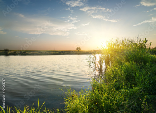 Quiet river at sunset