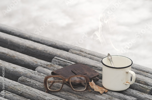 Vintage eyeglasses and hot drink