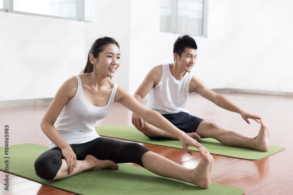 people working out in modern gym people working out in modern gym