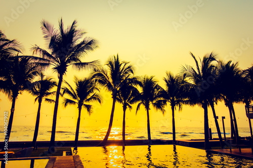 Silhouette palm tree with sunset