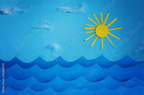 Summer background with paper.Sea wave and sun and sky