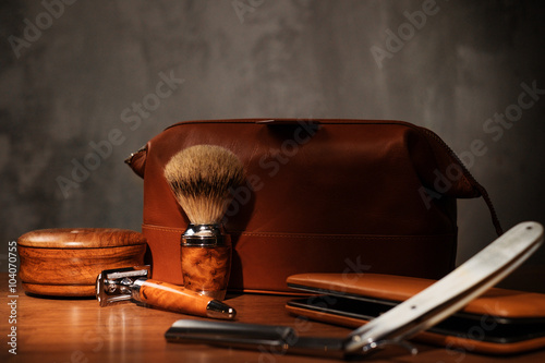 Fotografie Shaving accessories on a luxury wooden background.
