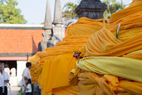 yellow cloth with flower in buddhist ceremony