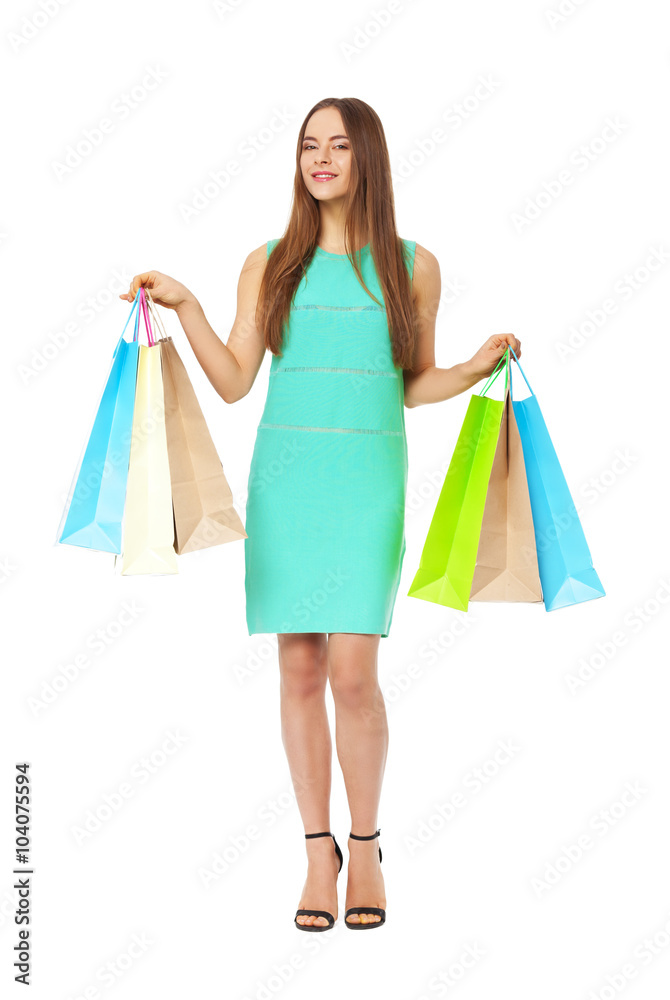 Fullbody portrait of beautiful woman with bags isolated on white