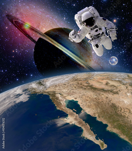 Astronaut spaceman moon saturn planet spacewalk earth outer space walk galaxy. Elements of this image furnished by NASA.