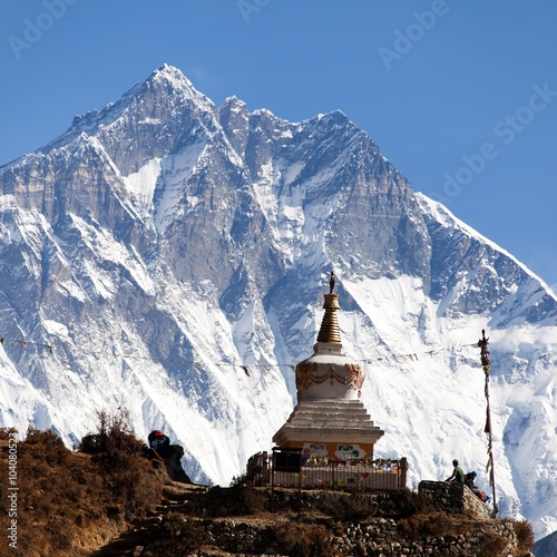 Stupa near Namche Bazar and Mount Lhotse south rock face