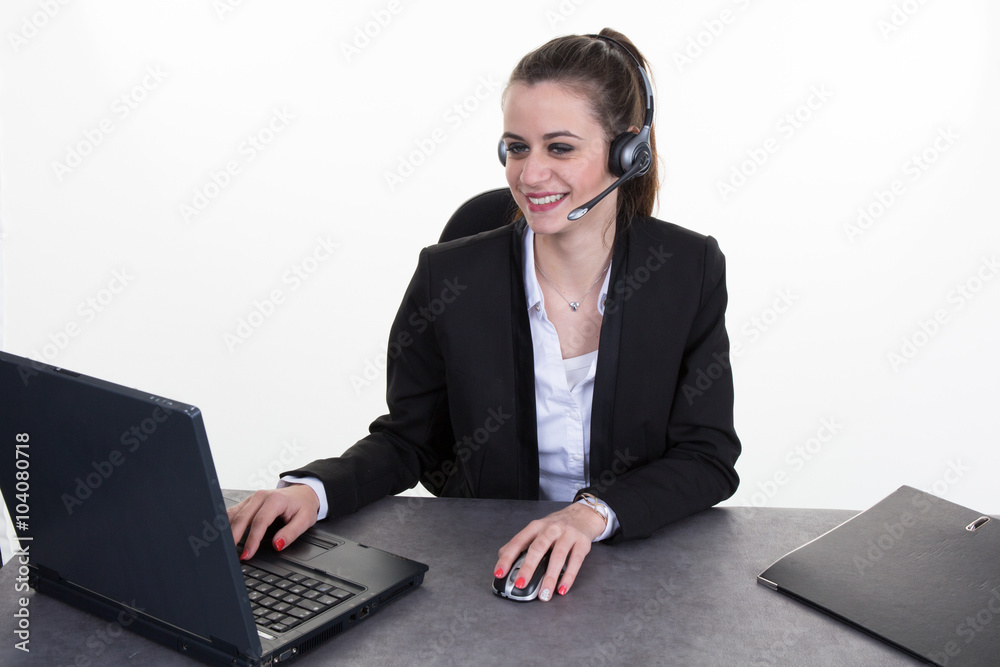 Cheerful young woman - Operator of call center with headset Cheerful young woman - Operator of call center with headset