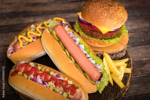 Obraz na plátne Fast food - Hot dogs, hamburger and French fries