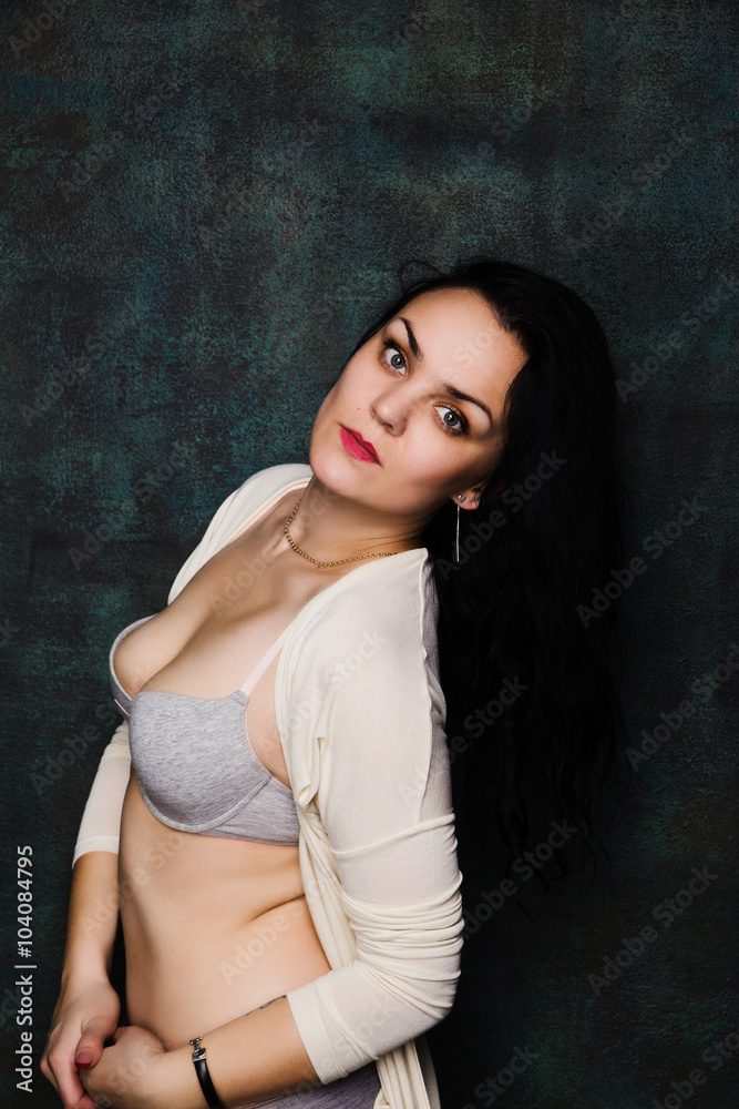 Studio portrait of a sexy brunette. Studio portrait of a sexy brunette.