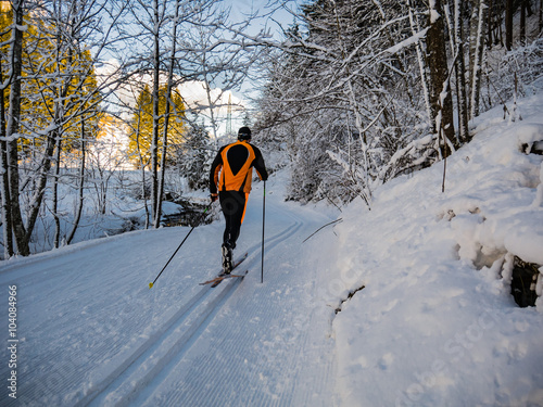 Athlete on a cross-country ski run photo