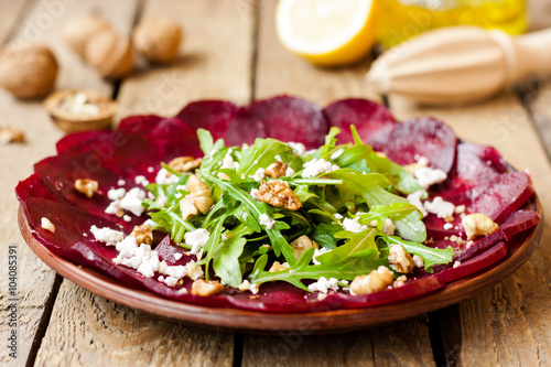 Beet salad with cheese and walnuts