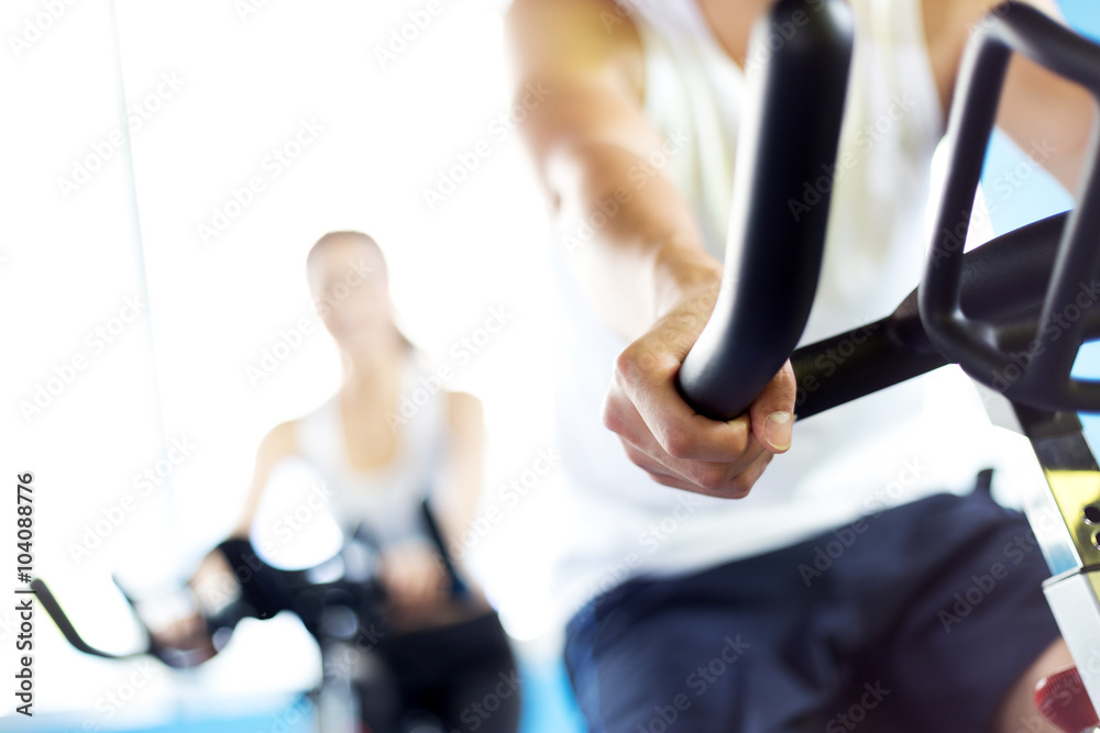 people working out in modern gym people working out in modern gym