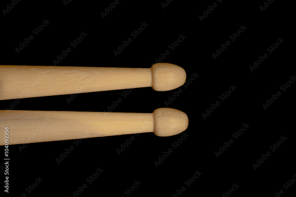 Drum sticks lay on an drum set Drum sticks lay on an drum set