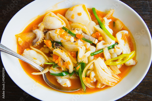 Stir fried squid with salted egg yolk (Thai Food)