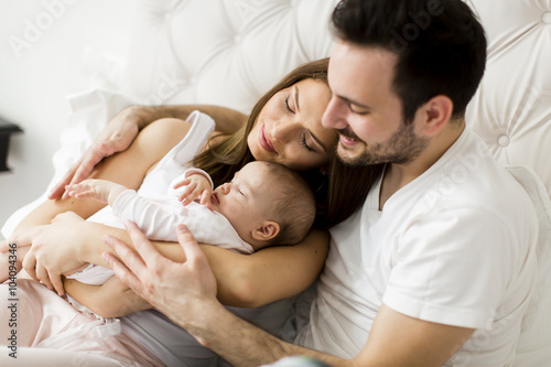 Bilde på lerret Happy family with newborn baby