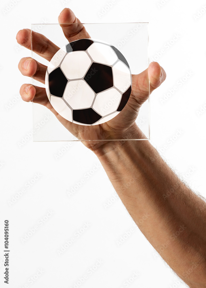 Man holding up a sign of a soccer ball