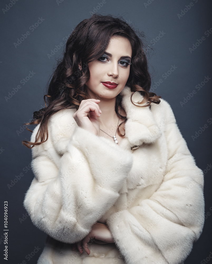 Vogue naked girl in the fur coat in the studio Vogue naked girl in the fur coat in the studio