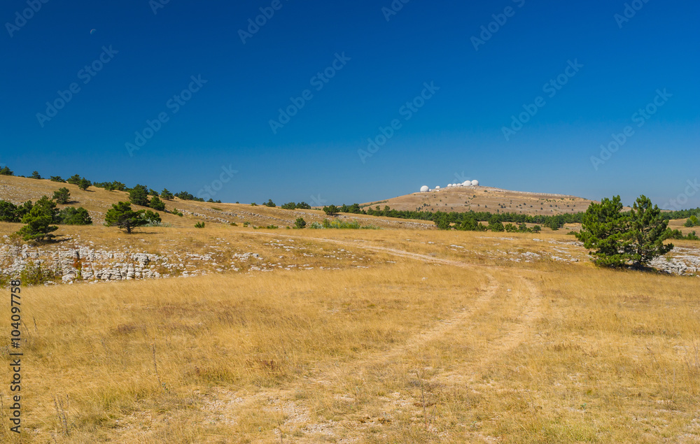Sunny autumanl landscape on Ai-Petri mountain tableland in Crimean peninsula
