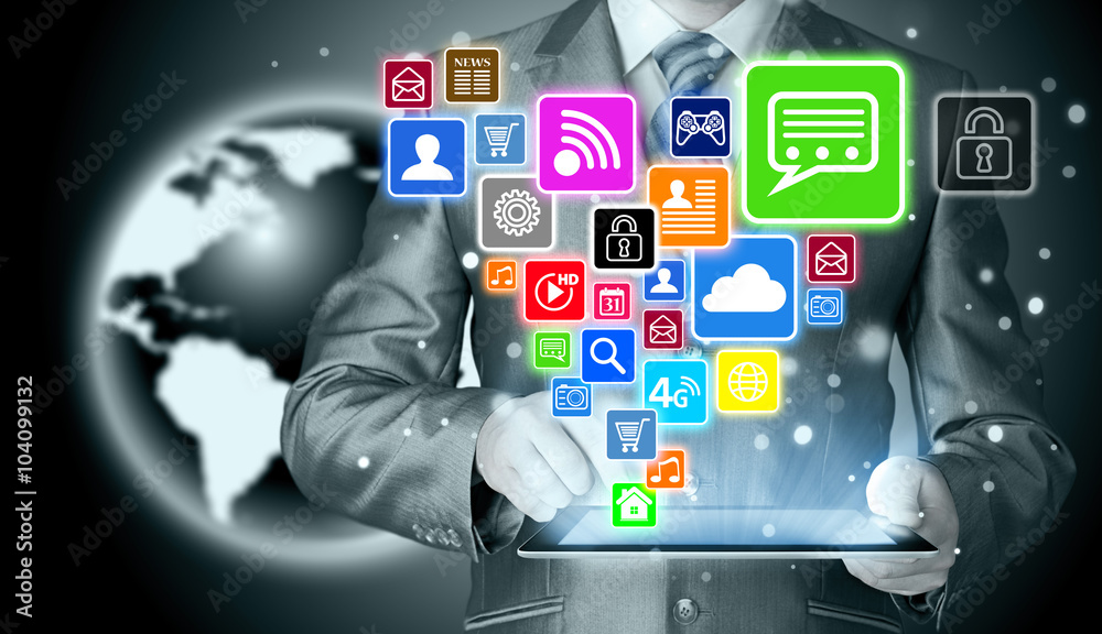 Business man using tablet PC with social media icon set Business man using tablet PC with social media icon set