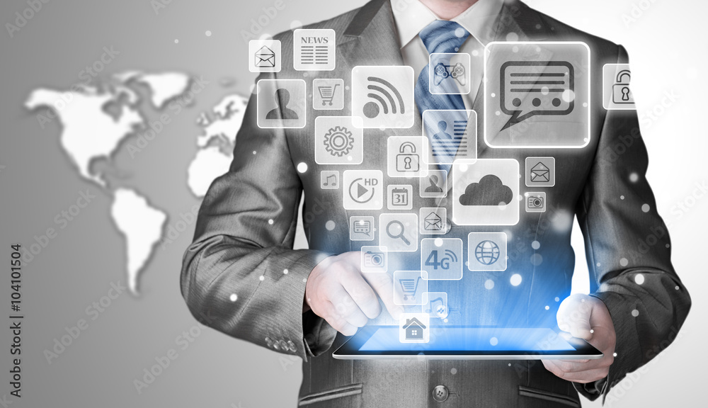 Business man using tablet PC with social media icon set Business man using tablet PC with social media icon set