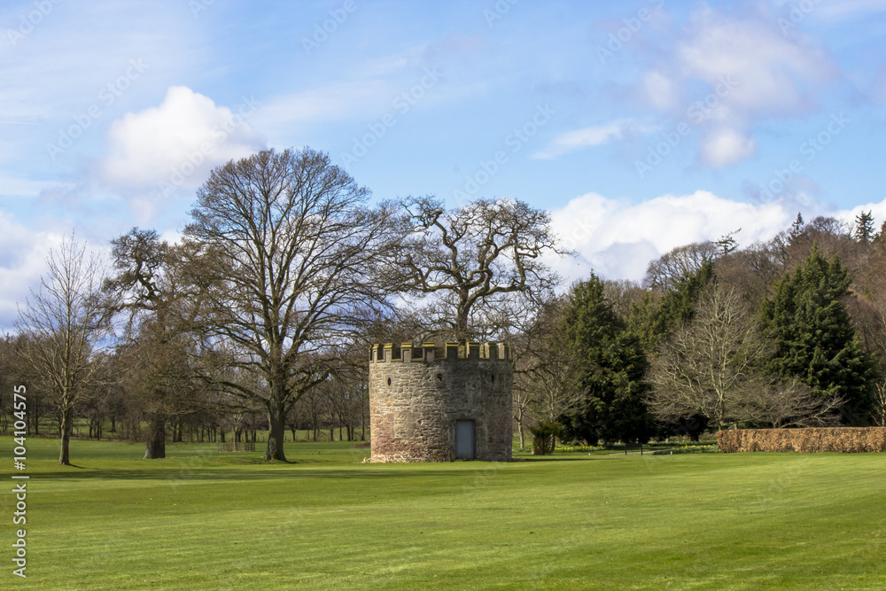 Park with a little tower that is located in the sorroundings of Glamis Castle, Scotland