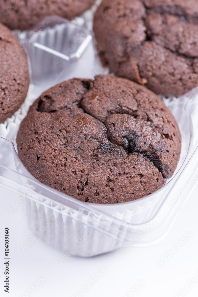 Close macro view of chocolate muffins Close macro view of chocolate muffins