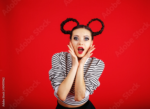 Cuadro en lienzo High fashion girl with unusual hairstyle like Minnie Mouse in the studio
