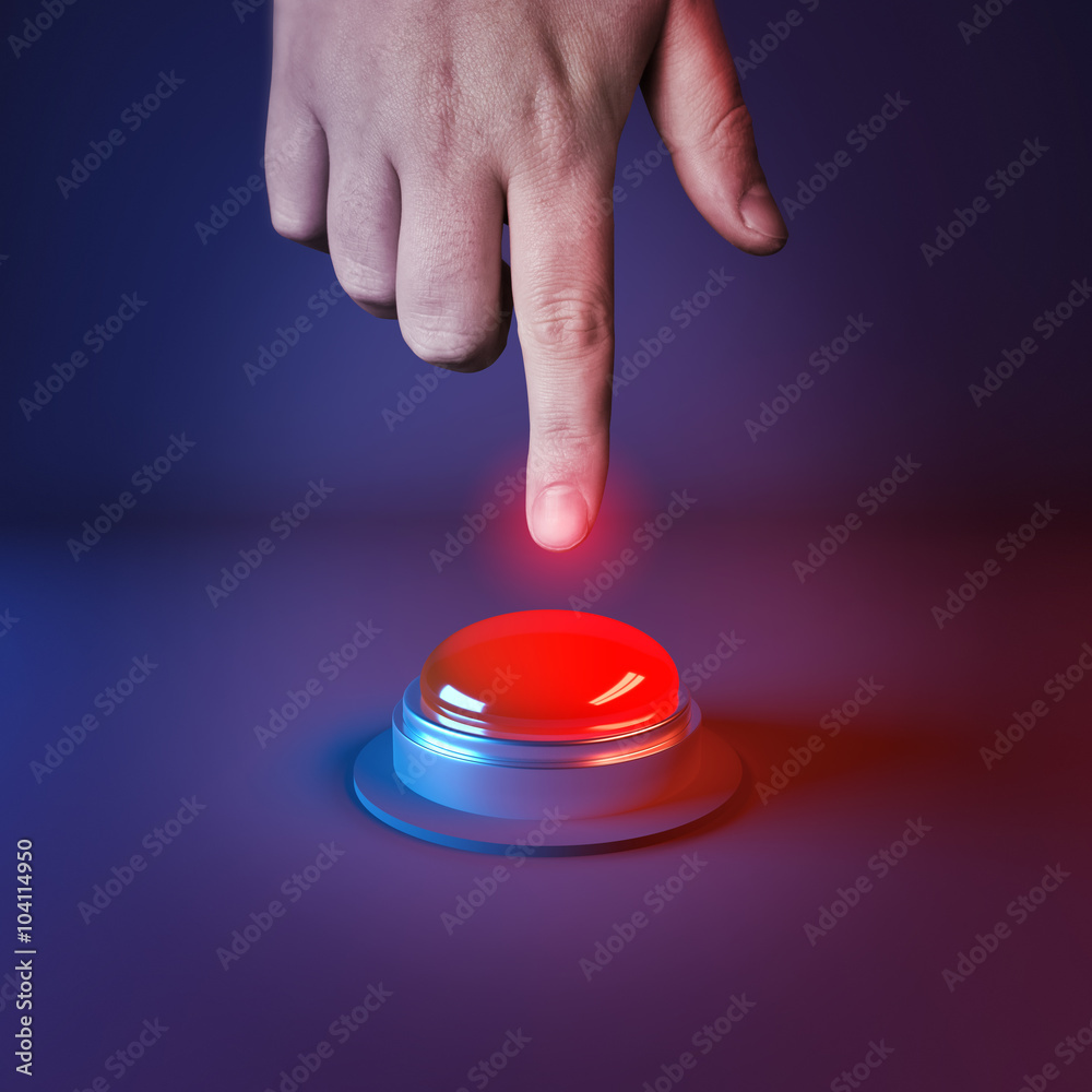 Pushing A Panic Button. A person about to press a big red button. Stock  Photo