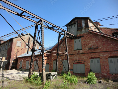 Vintage abandoned brick mining buildings in northern Michigan - landscape color photo