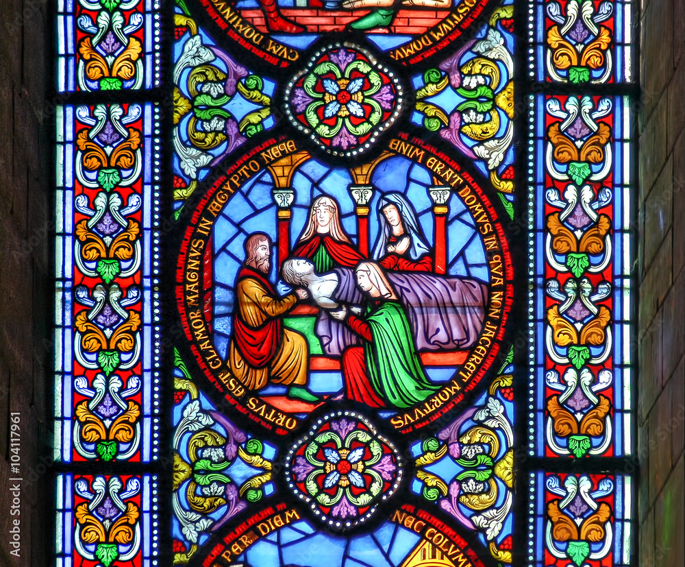 Stained glass window depicting the death of the fiirst born