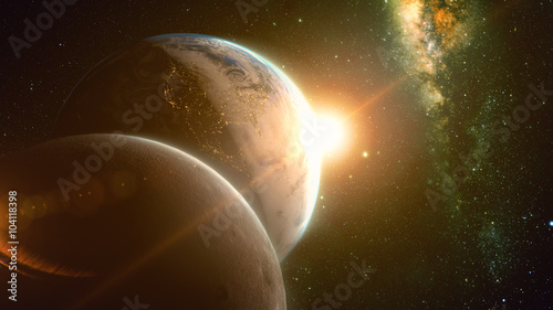 spectacular sunrise view over Planet Earth and moon with milkyway in background.