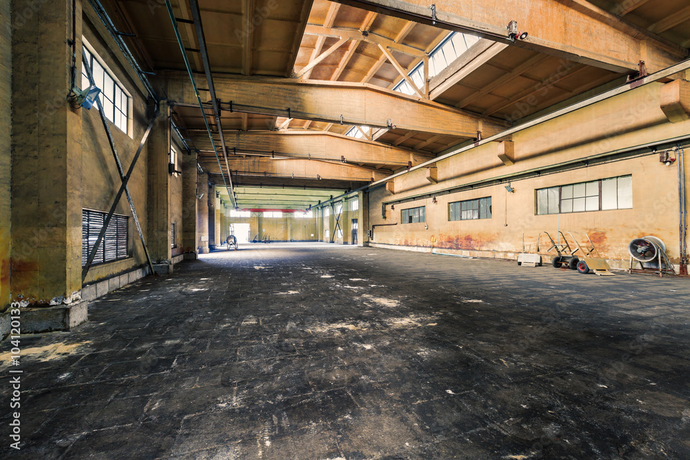 abandoned old industrial factory building in dark colors