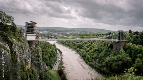 he Clifton Suspension Bridge is spanning the Avon Gorge and the River Avonin Bristol, England.